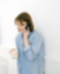 Woman speaking with a family support counsellor during an online session
