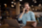 Person using laptop at home during confidential online addiction recovery program.