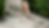 Person walking barefoot on a stone path in nature, symbolising peace, grounding, and the journey of repressed anger release.